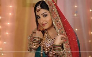 Baby looking beautiful in bridal wear